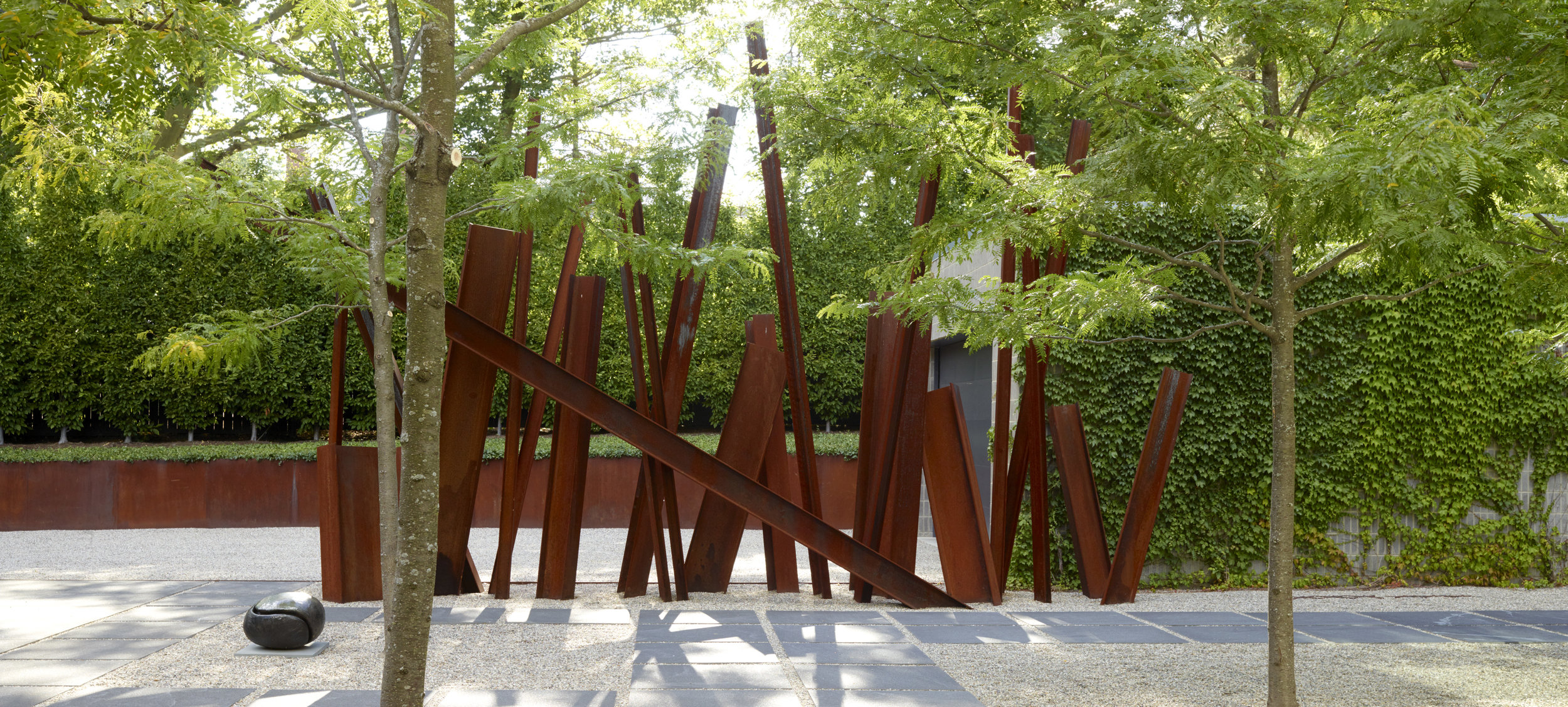 andrea cochran architecturaal in combinatie met bomen